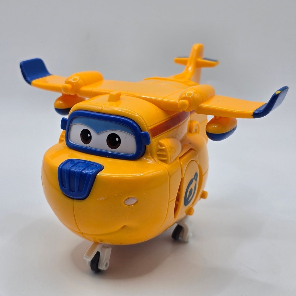 Super Wings Donnie Transforming Toy Yellow Plane Robot Figure